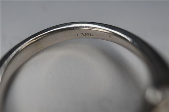 An 18ct white metal and single stone diamond ring, with marquise cut diamond set shoulders, size H/I.
